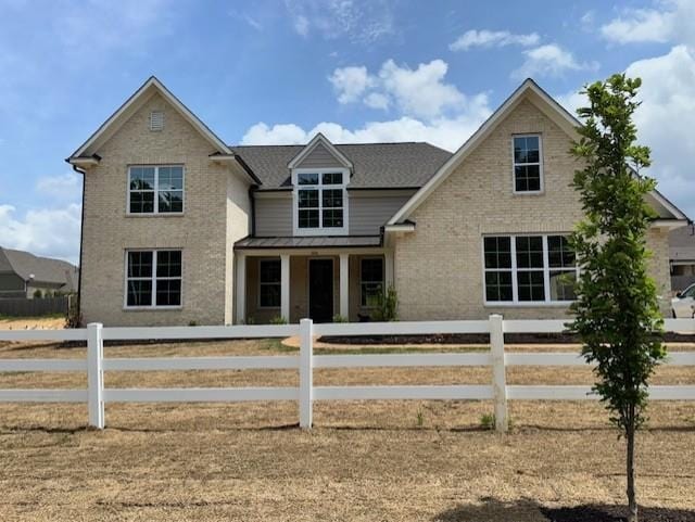 5876 Milton Wilson Blvd, Arlington, TN 38002 - view of front of house with brick siding and a fenced front yard