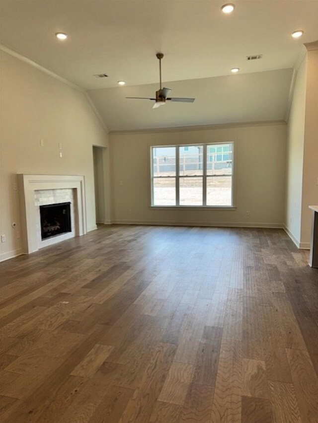 5876 Milton Wilson Blvd, Arlington, TN 38002 - unfurnished living room with ornamental molding, wood finished floors, baseboards, ceiling fan, and vaulted ceiling