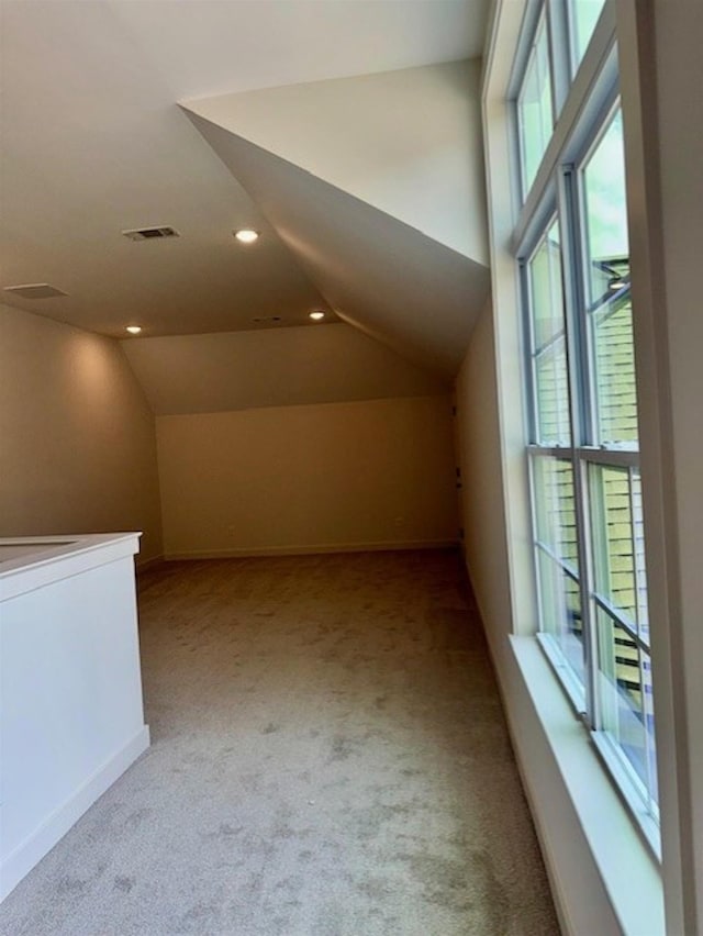 5876 Milton Wilson Blvd, Arlington, TN 38002 - bonus room with vaulted ceiling, visible vents, carpet flooring, and a wealth of natural light