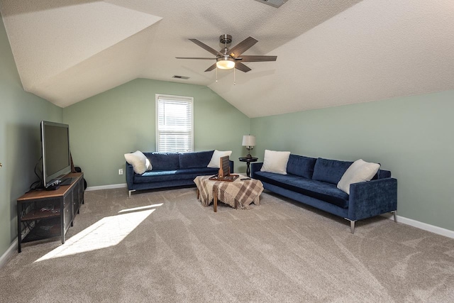 living room with visible vents, a textured ceiling, carpet, and vaulted ceiling