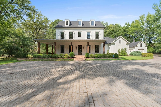 view of front of property featuring covered porch