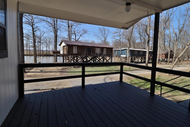 wooden deck with a water view