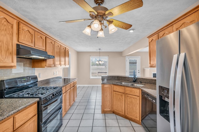 kitchen with black appliances, under cabinet range hood, a sink, light tile patterned floors, and decorative backsplash