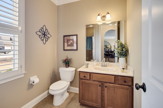 full bathroom with tile patterned floors, toilet, vanity, and baseboards