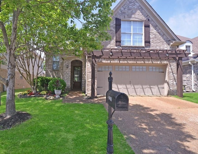 traditional-style house featuring brick siding, a garage, concrete driveway, and a front yard