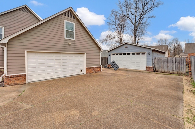 garage with fence