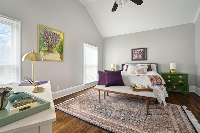 bedroom featuring ornamental molding, wood finished floors, baseboards, and vaulted ceiling