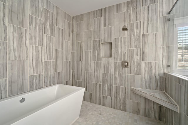 bathroom with a walk in shower and a tub to relax in