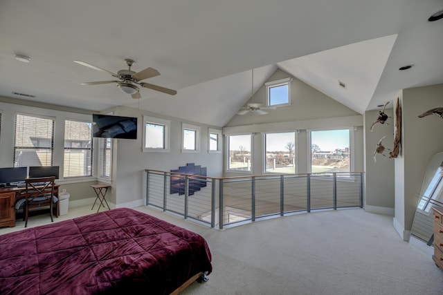 bedroom featuring baseboards, multiple windows, carpet floors, and lofted ceiling