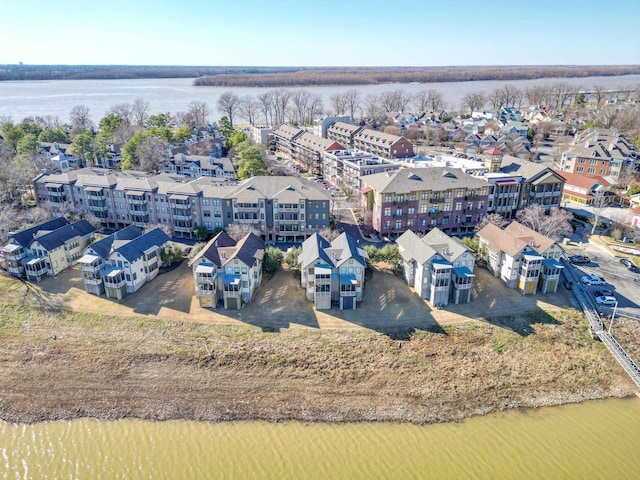 bird's eye view with a water view and a residential view