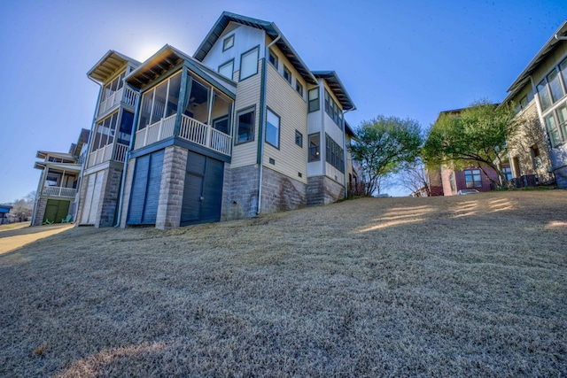 view of side of home featuring a garage