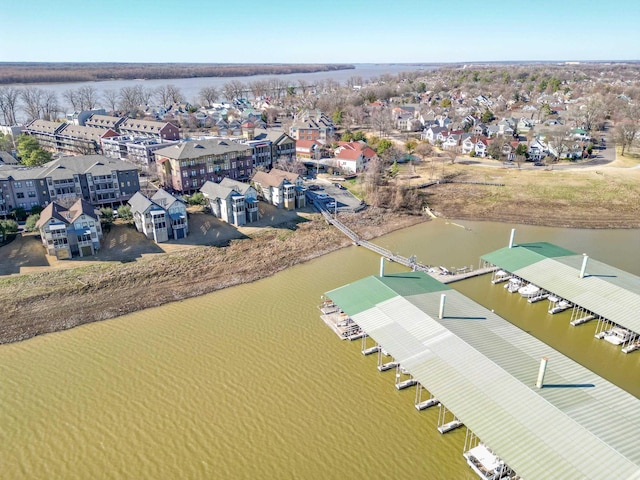 aerial view with a residential view and a water view