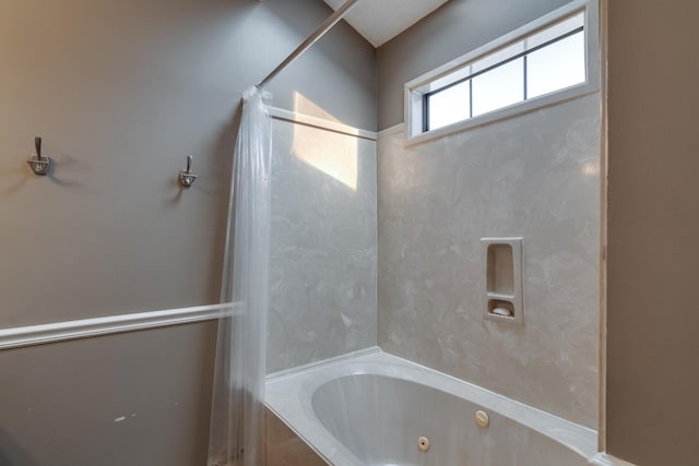 full bath featuring a combined bath / shower with jetted tub