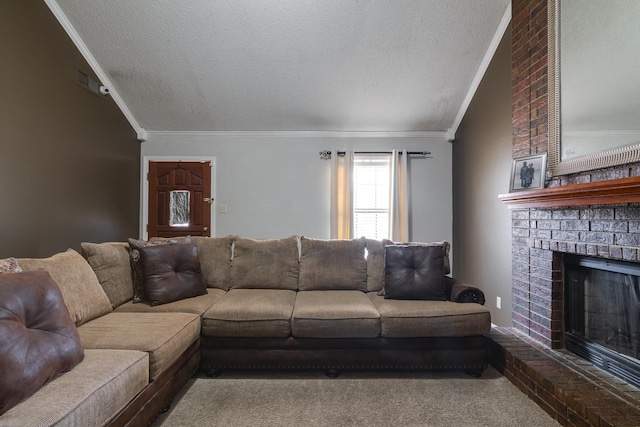 living room with carpet flooring, a textured ceiling, a fireplace, and crown molding