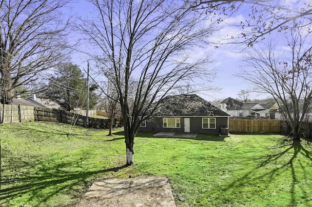 view of yard with a fenced backyard