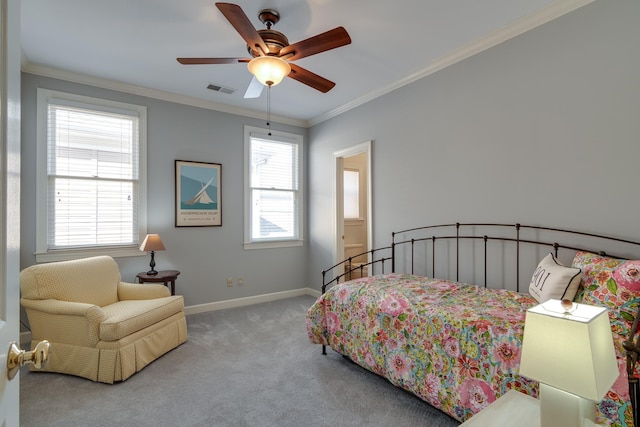 bedroom featuring a ceiling fan, carpet, visible vents, baseboards, and crown molding