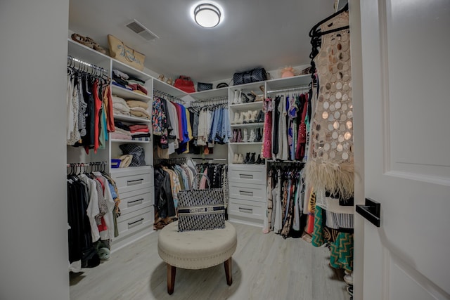 spacious closet featuring visible vents and light wood finished floors