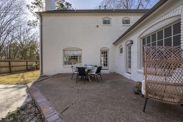 view of patio featuring fence