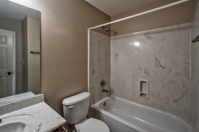 bathroom with toilet, a textured ceiling, vanity, and  shower combination