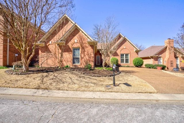 view of front of house featuring brick siding