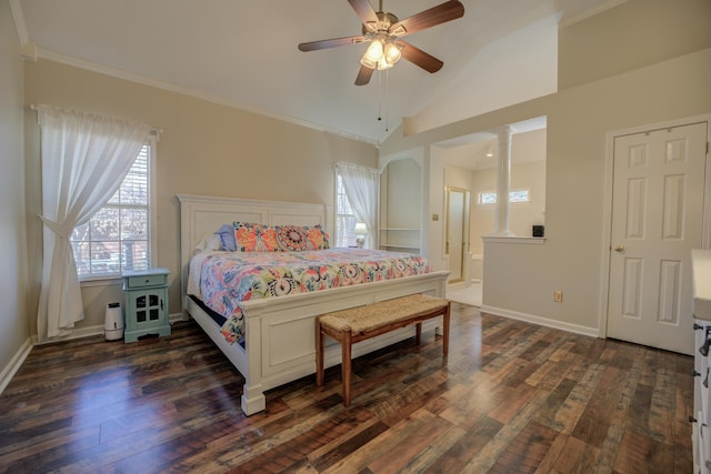 bedroom with crown molding, baseboards, dark wood-type flooring, and lofted ceiling