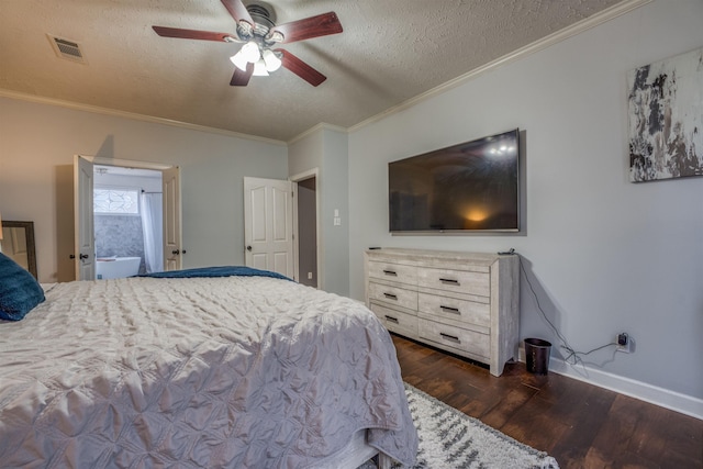 bedroom featuring dark wood finished floors, ornamental molding, visible vents, and a textured ceiling