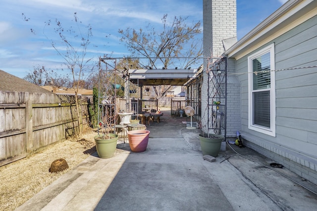 view of patio / terrace featuring outdoor dining space and a fenced backyard