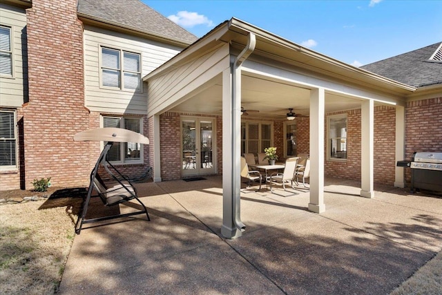 view of patio / terrace featuring grilling area, french doors, and ceiling fan