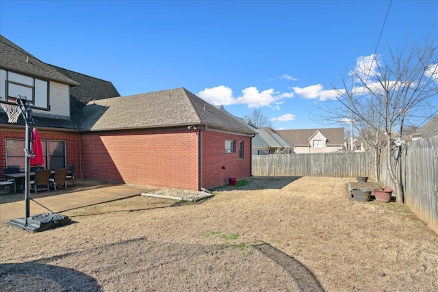 exterior space featuring a patio and a fenced backyard