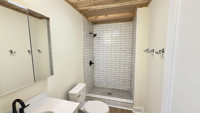 full bath with wood ceiling, a shower stall, toilet, and vanity