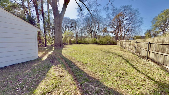 view of yard with fence