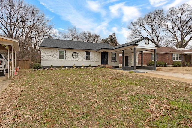 single story home featuring brick siding, a front lawn, and fence