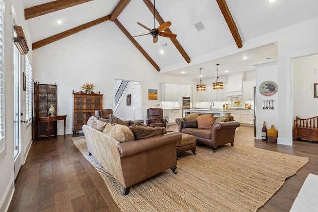 living area with visible vents, beam ceiling, high vaulted ceiling, and dark wood-style flooring