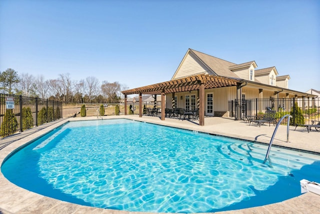 community pool with a patio, fence, and a pergola