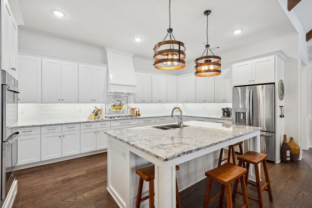 kitchen featuring a sink, white cabinets, stainless steel fridge with ice dispenser, custom exhaust hood, and dark wood-style flooring