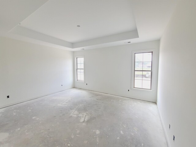 9622 Grays Hollow Dr S, Cordova, TN 38018 - spare room with a tray ceiling and unfinished concrete floors