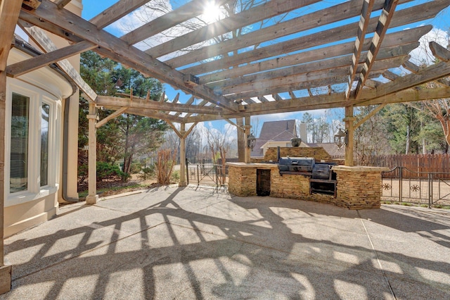 view of patio / terrace with area for grilling, fence, a pergola, and grilling area