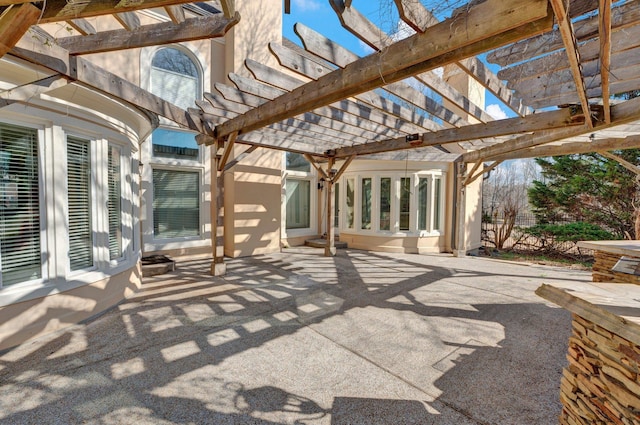 view of patio featuring a pergola