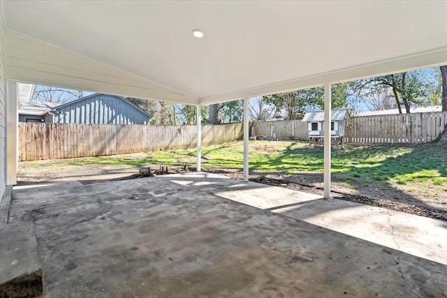 view of patio / terrace featuring an outdoor structure and a fenced backyard