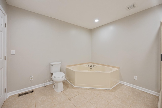 full bath with tile patterned floors, toilet, a bath, and visible vents