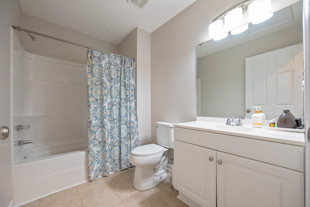 bathroom with visible vents, toilet, shower / bath combo, tile patterned flooring, and vanity