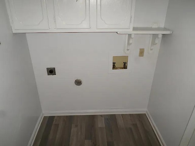 clothes washing area featuring dark wood finished floors, hookup for an electric dryer, baseboards, and washer hookup