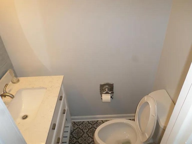 bathroom with vanity and toilet