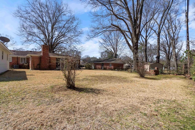 view of yard with an outbuilding and cooling unit