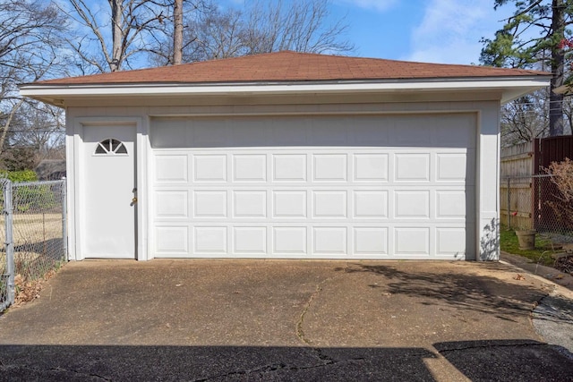 detached garage with fence