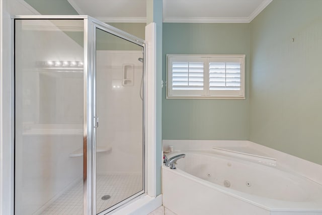 bathroom with a tub with jets, a stall shower, and ornamental molding