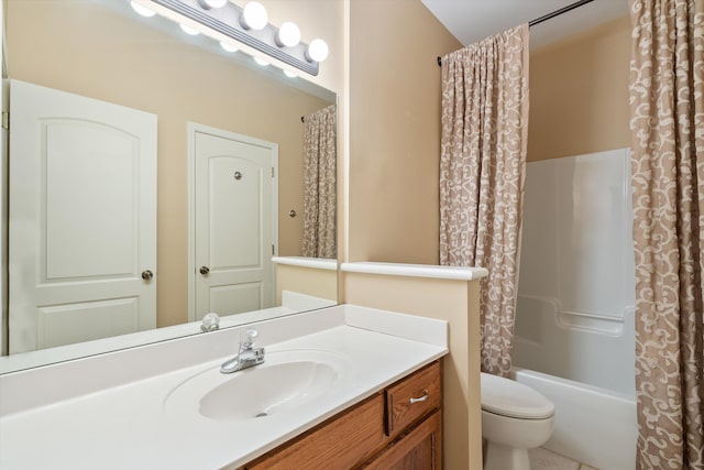 full bath with vanity, toilet, and shower / tub combo