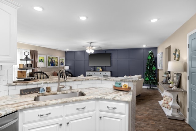 kitchen with a sink, dishwasher, recessed lighting, a ceiling fan, and dark wood-style flooring