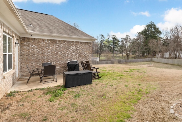 view of yard with a fenced backyard and a patio