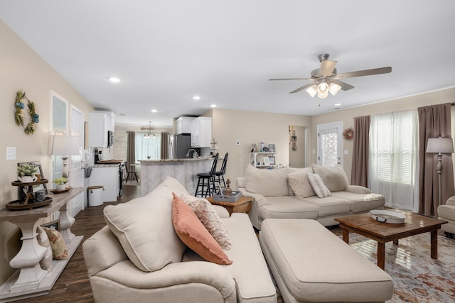 living room featuring dark wood finished floors, recessed lighting, and ceiling fan